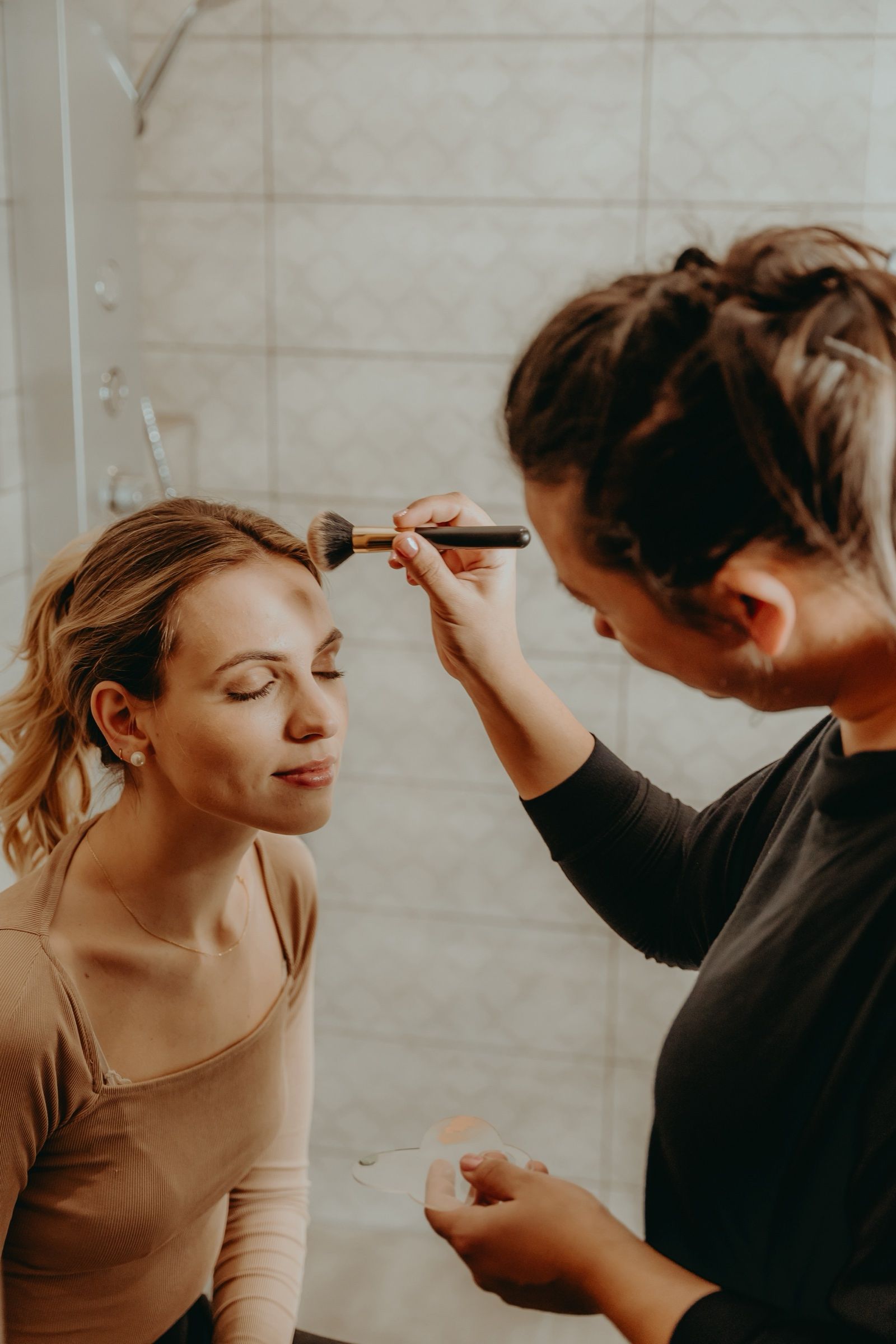 Make-up artist preparing talent