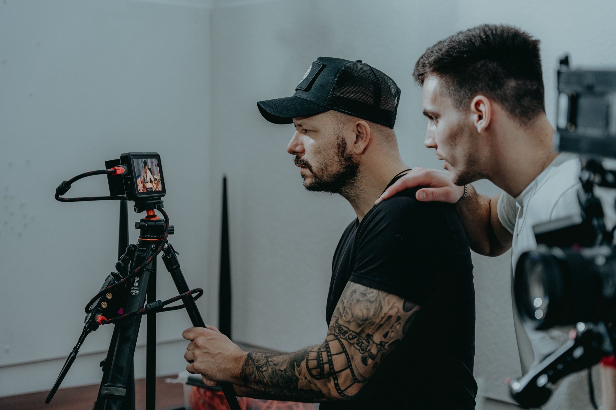 Crew working around the tripod